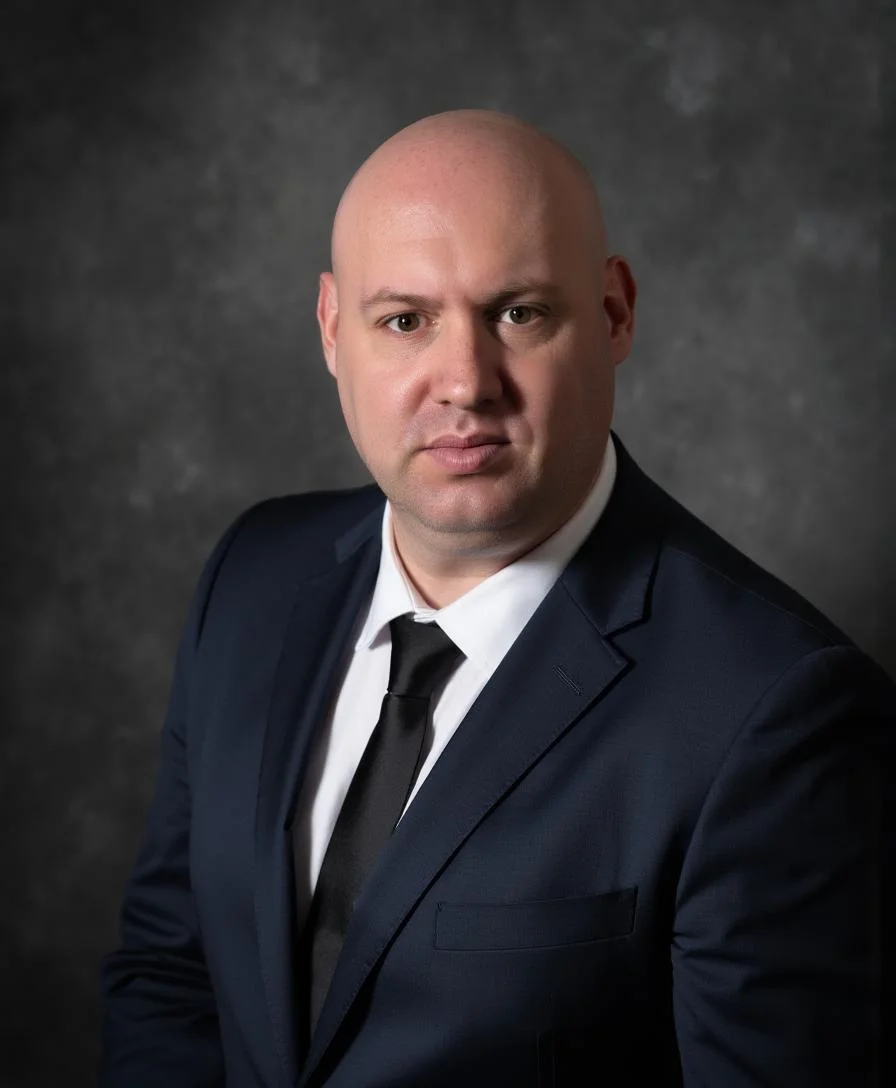 Joel R Klemmer refined studio portrait with graphite backdrop