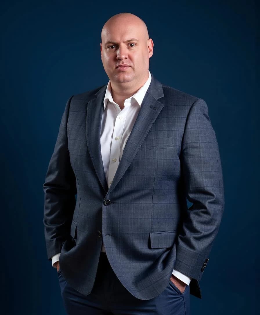 Joel R Klemmer professional studio portrait with graphite background